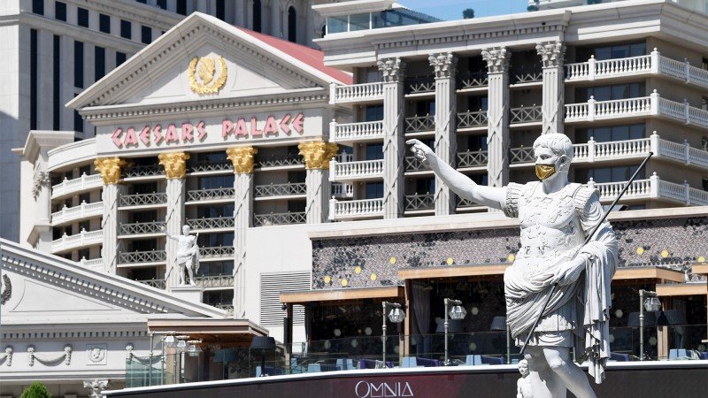 Caesars to sell Strip asset after record Q4 earnings for Vegas; cuts sportsbook ad spending